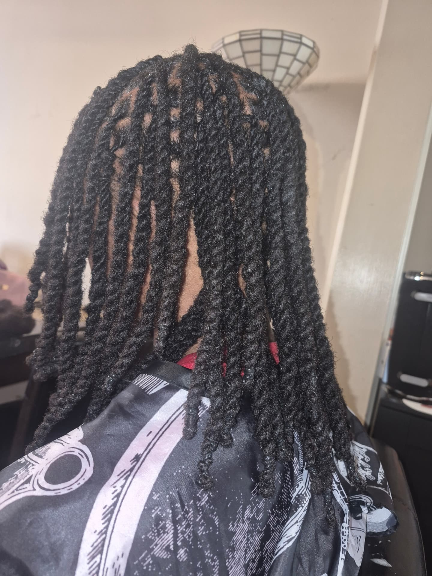 Fresh full-length retwist viewed from behind